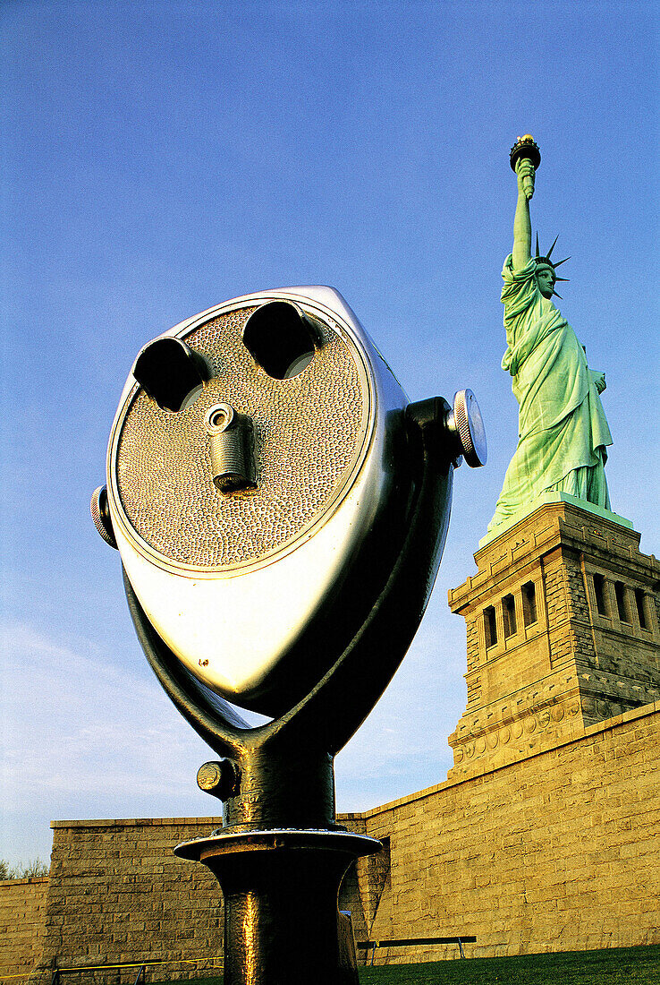 Statue of Liberty and telescope. New York City. USA