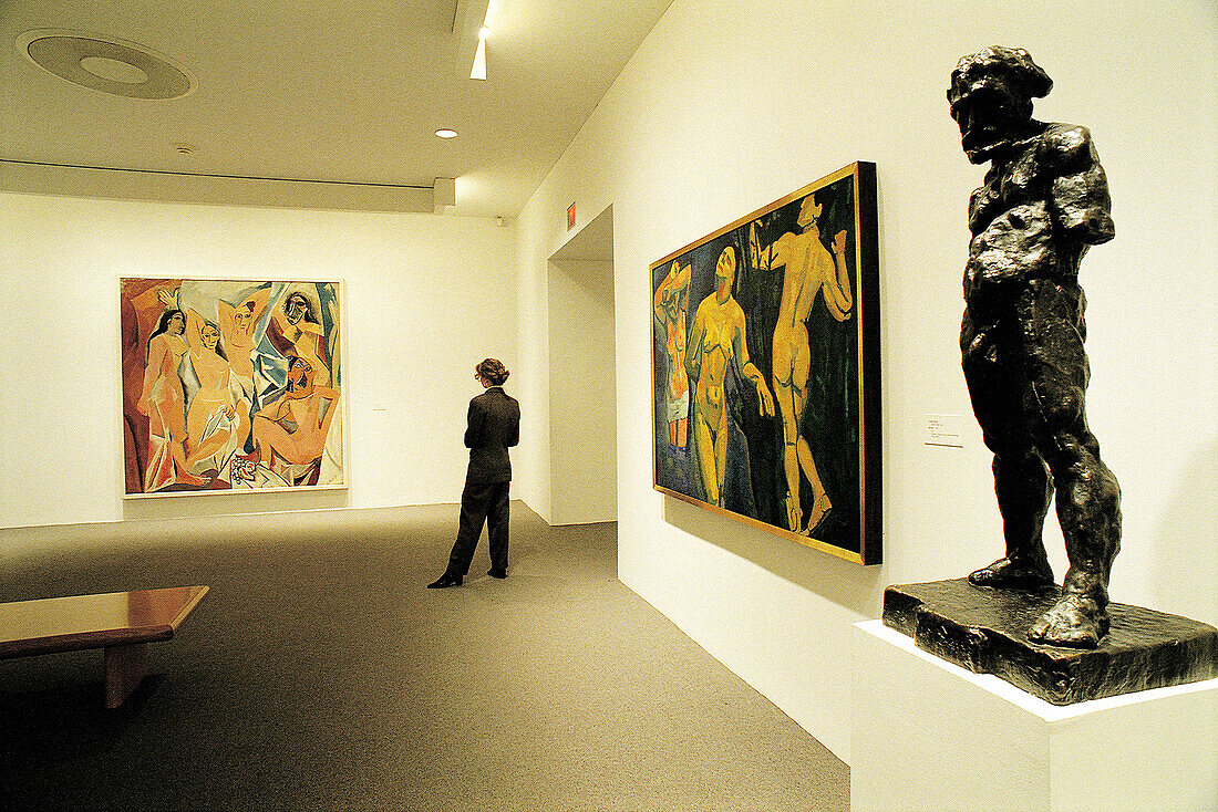 Les demoiselles d Avignon (1907), by Picasso. Visitor at Museum of Modern Art. New York City. USA