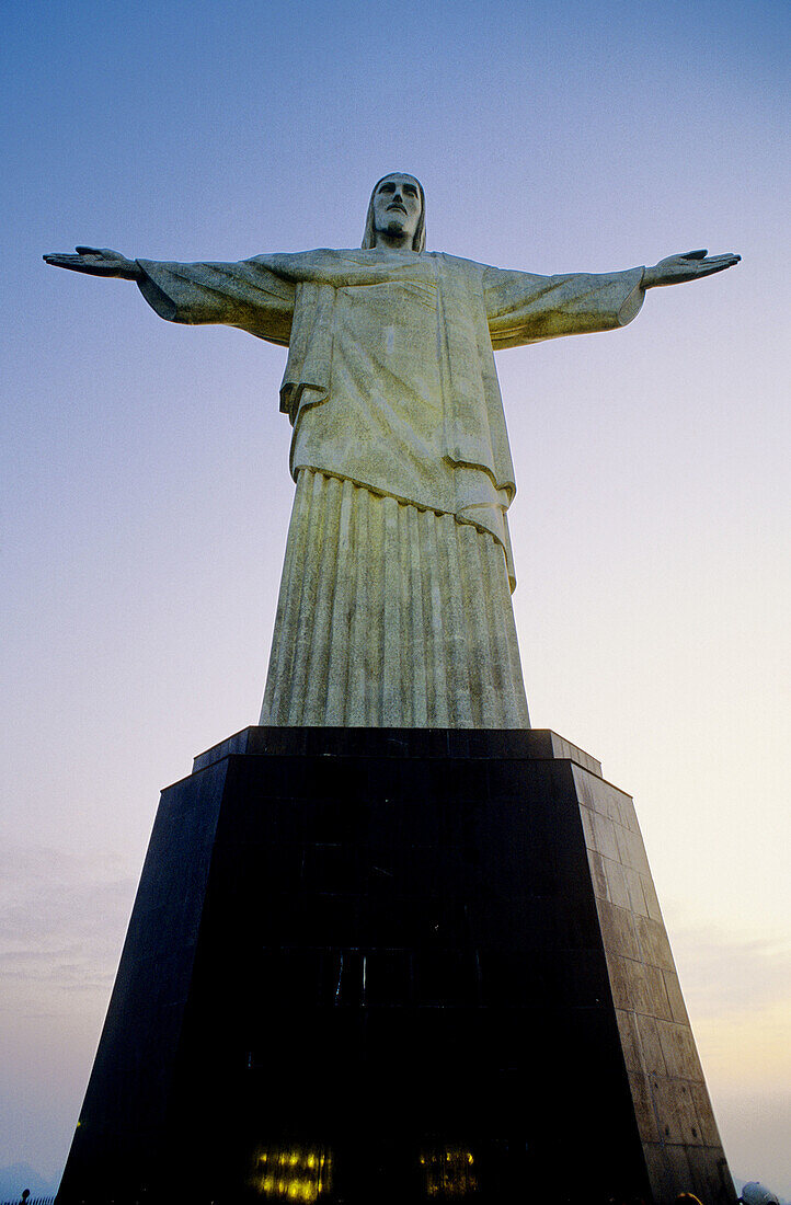 The Corcovado Christ sculpture at dusk. City of Rio de Janeiro. Brazil