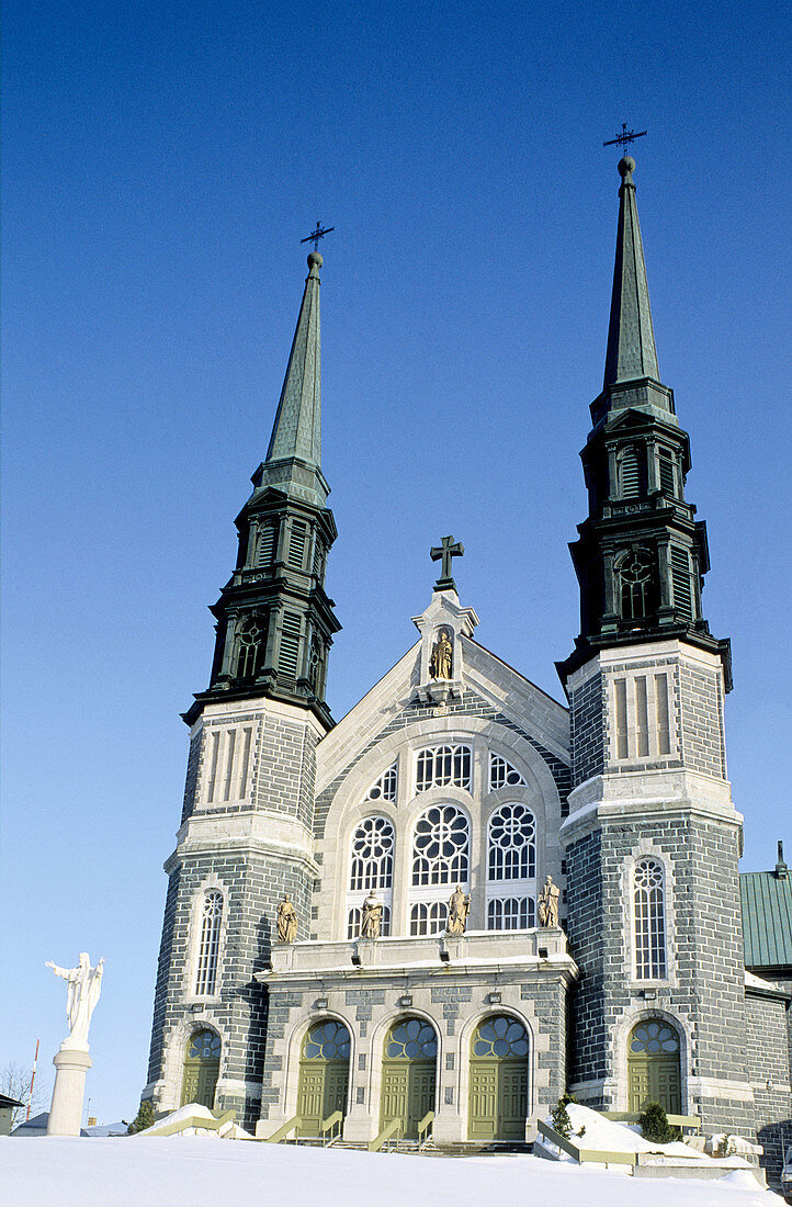 Church and Christ statue. City of Quebec in winter. Quebec. Canada