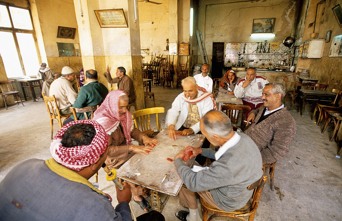 Men playing dominos in a popular Cafe. Alexandria. Egypt