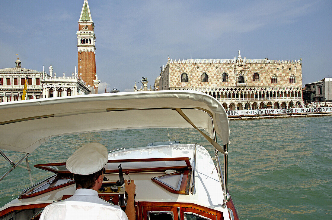 On a motoscafo (expensive water taxi). City of Venice. Italy