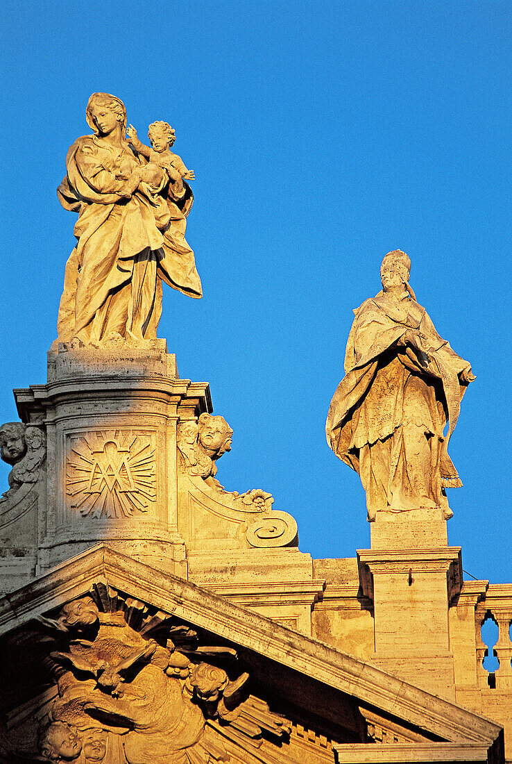 Virgin with child statue on top of facade, Basilica Santa Maria Maggiore. Rome. Italy