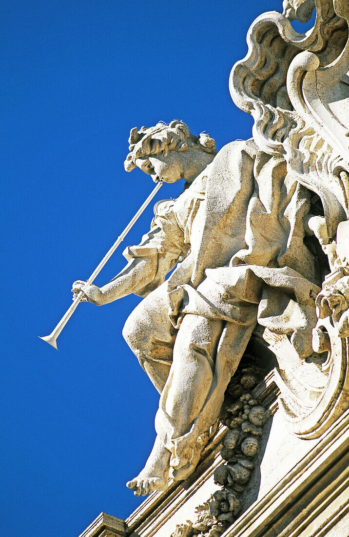 Detail of sculpture on the top of Trevi fountain. Rome, Italy