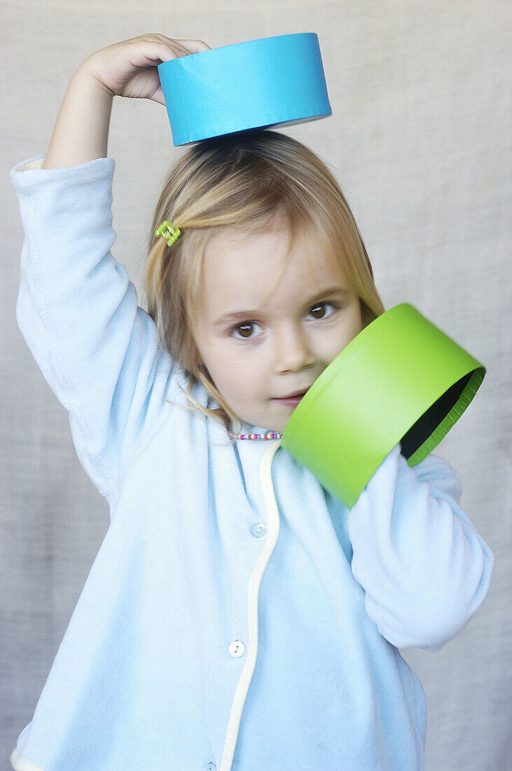 Caucasians, Child, Childhood, Children, Color, Colour, Contemporary, Fair-haired, Female, Girl, Girls, Hold, Holding, Human, Indoor, Indoors, Infant, Infantile, Infants, Informal, Innocence, Innocent