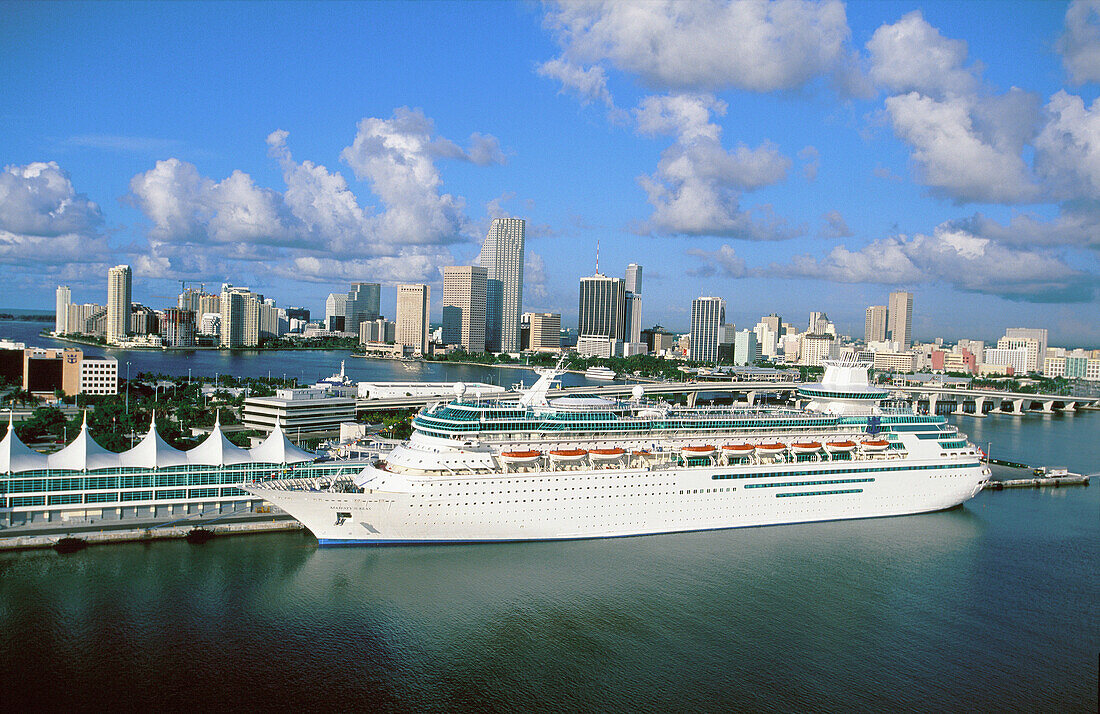Aerial of Miami downtown, liner at harbour at fore