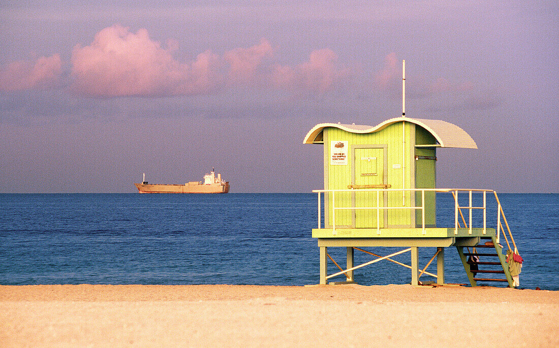 Cabin on the beach, ship at rear, Miami Beach, Fl, USA