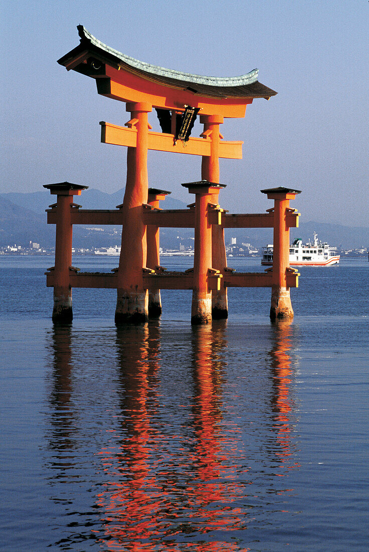 Itsukushima Torii (temple gate) in the sea. Miyajima island. Japan