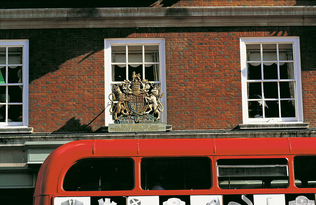 Bus and brick facades. London. England