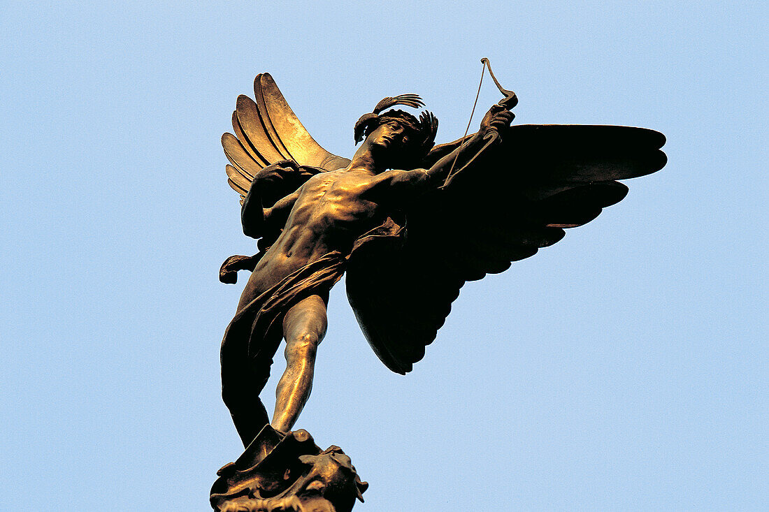 Eros statue on top of picadilly monument. Picadilly. London. England