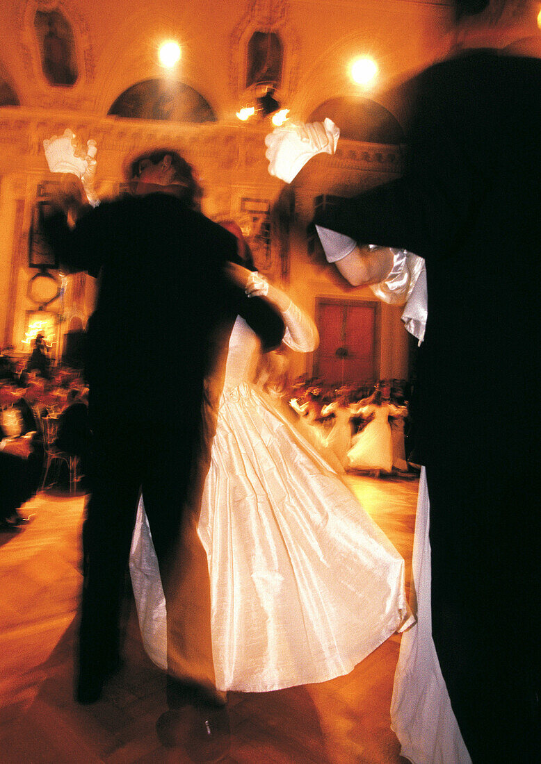 Couple waltzing. Winter ball in Hofburg imperial palace ballroom. Vienna. Austria