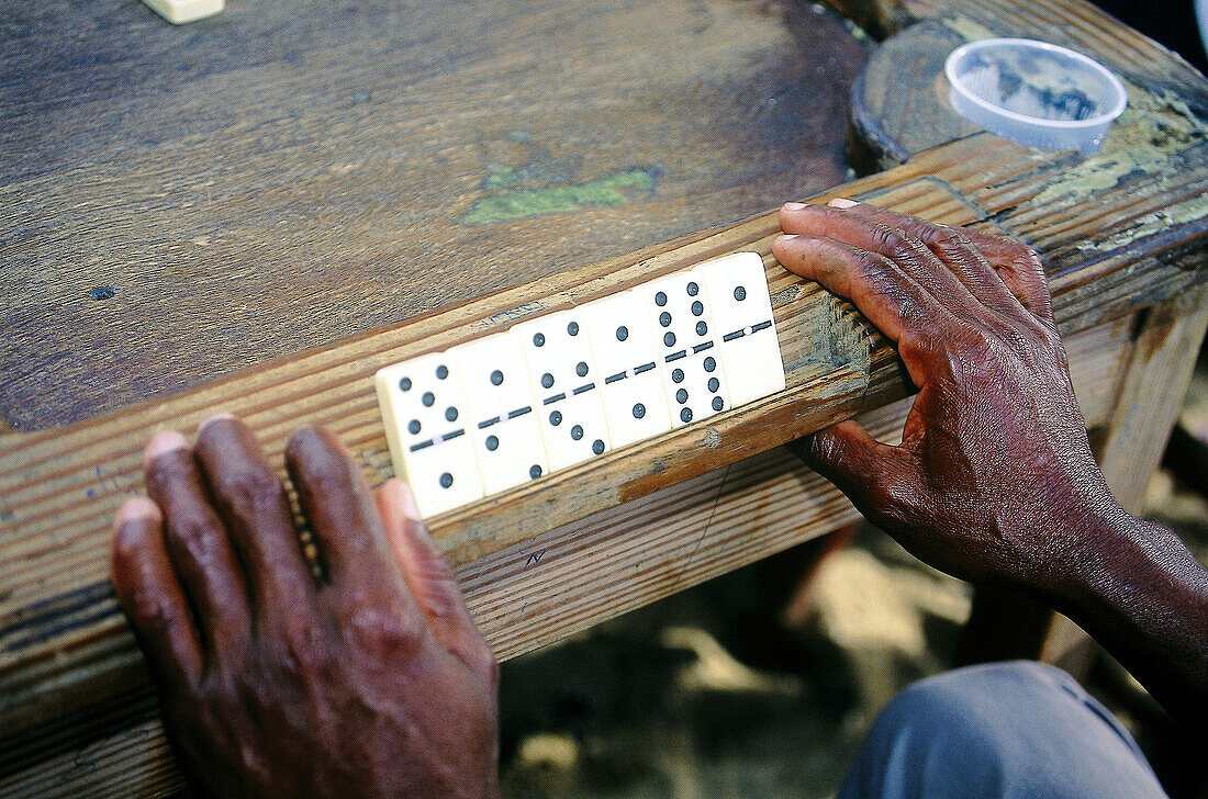 Man playing domino. Dominican Republic