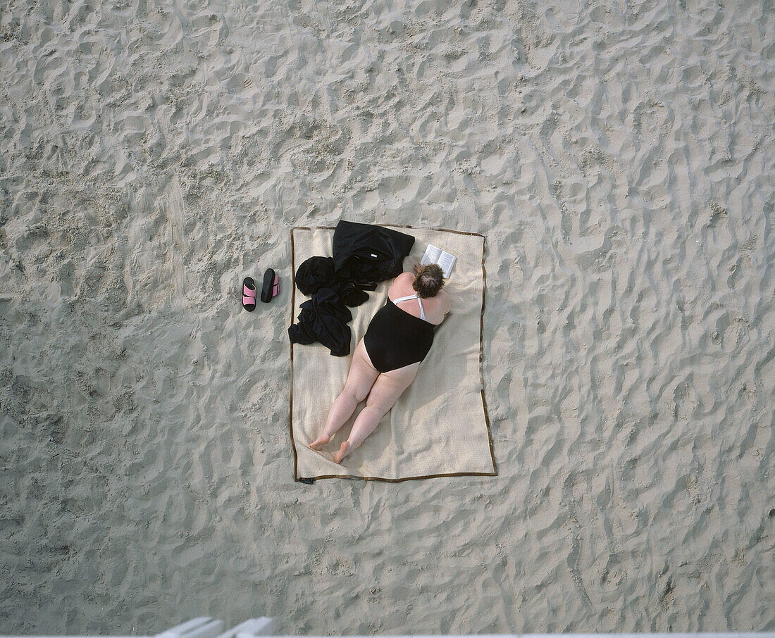 Obese woman on beach. Usedom. Mecklenburg-Western Pomerania. Germany