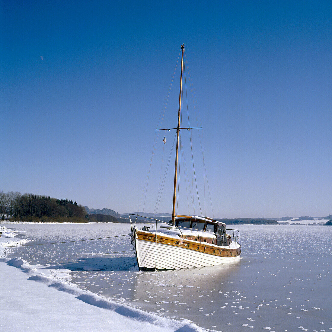 Boat on ice. Moldaustausee. Czech Republic