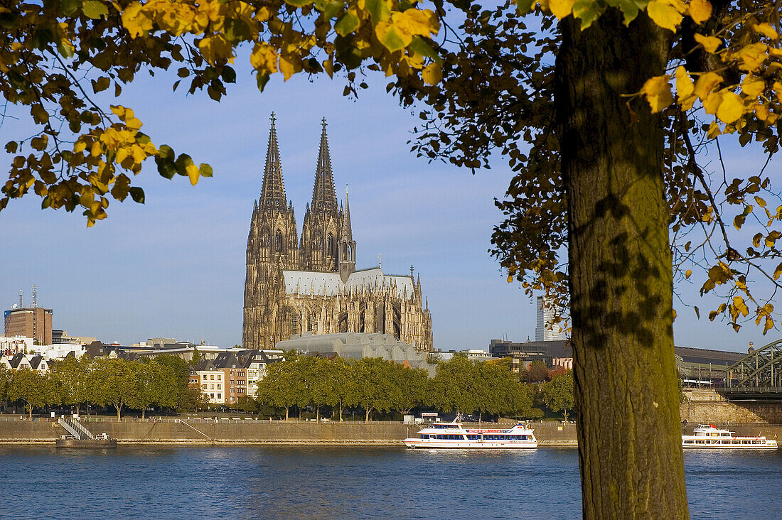 Germany, North Rhine-Westphalia. Cologne. Cathedral and Hohenzollernbrucke daytime