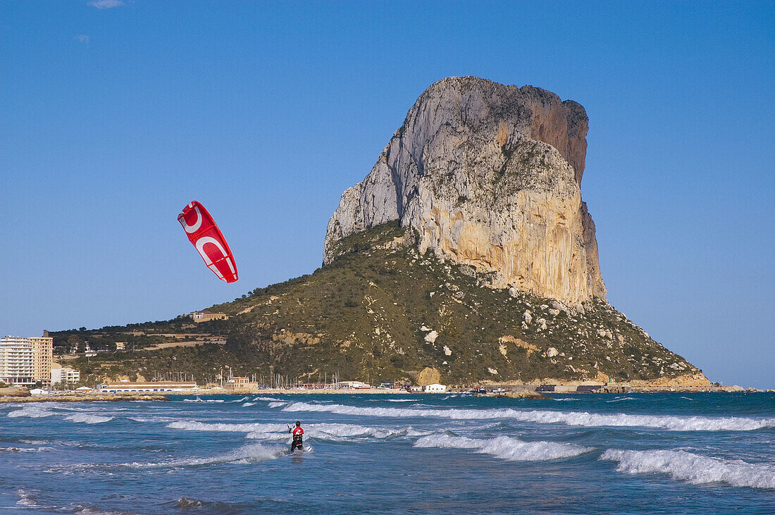 Spain. Alicante Province. Calpe. Penon de Ifach. Beach with kitesurfer