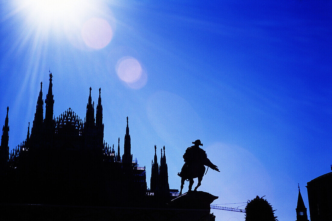 Milan cathedral and Vittorio Emanuelle II equestrian monument. Cathedral square. Milan. Italy.