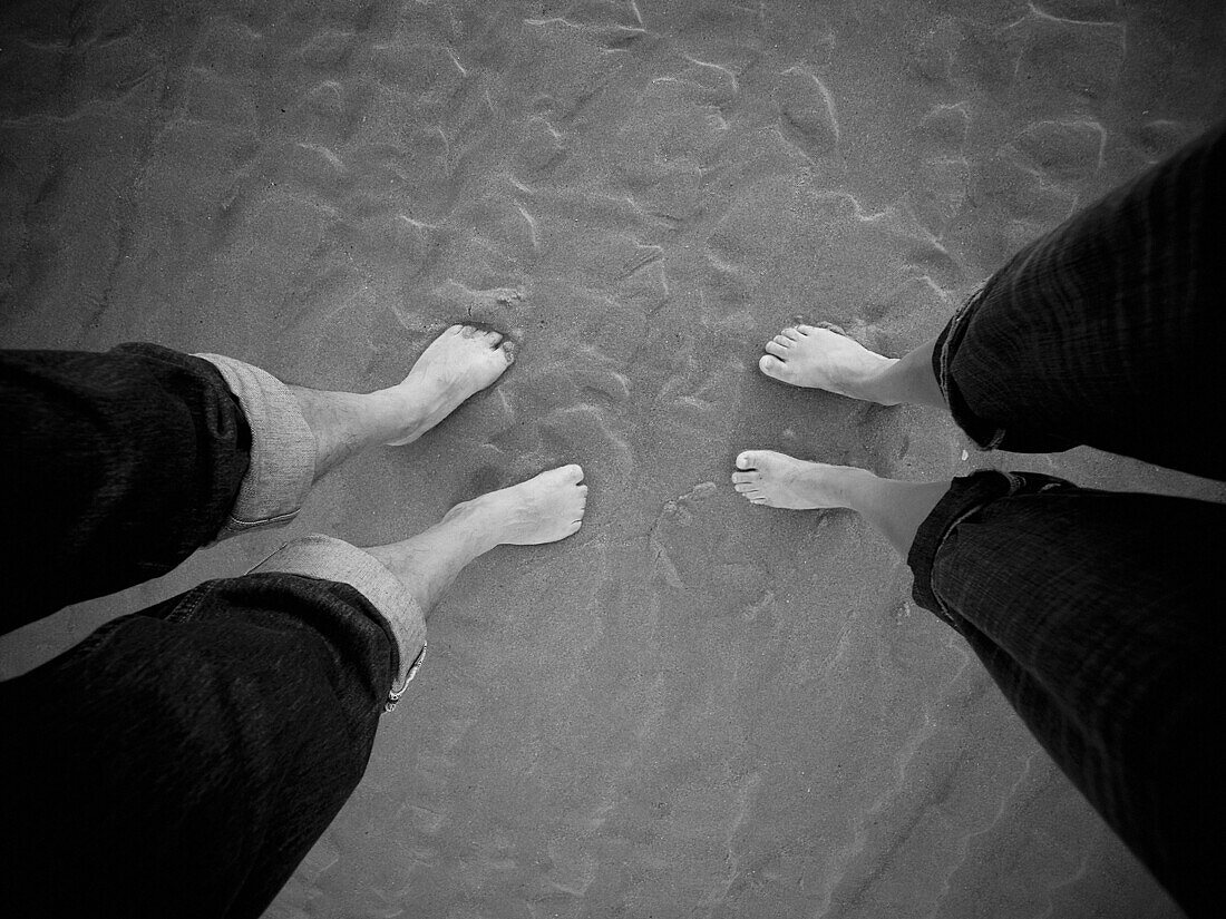  Adult, Adults, B&W, Barefeet, Barefoot, Beach, Beaches, Black-and-White, Close up, Close-up, Closeup, Contemporary, Covered, Daytime, Detail, Details, Exterior, Feet, Foot, Human, Monochromatic, Monochrome, Outdoor, Outdoors, Outside, Pair, Pant, Pants, 