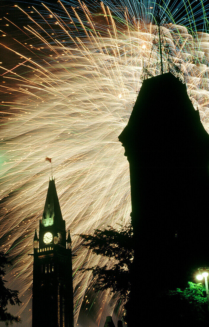Fireworks behind Parliament buildings on Canada National Day. Ottawa. Ontario. Canada