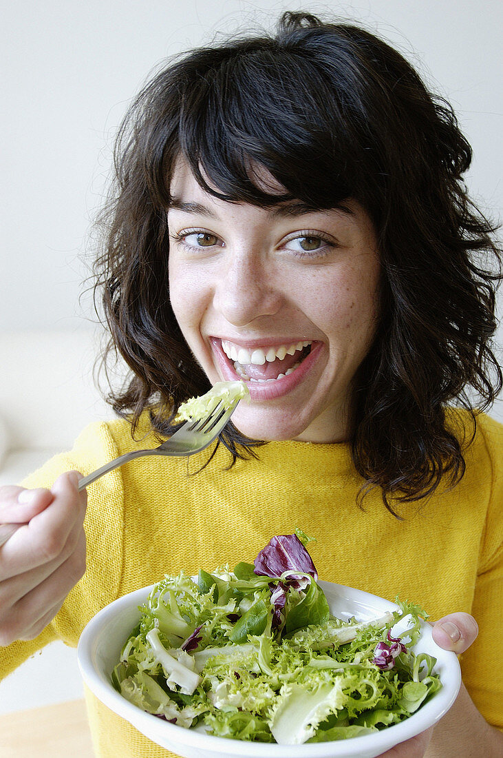 Girl having a salad
