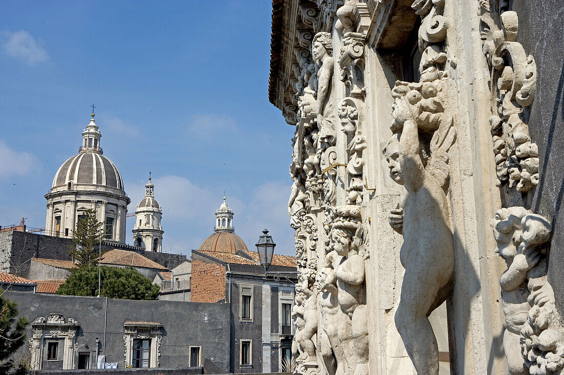 Palazzo Biscari, detail of the façade with cathedral dome in background. Catania. Sicily, Italy