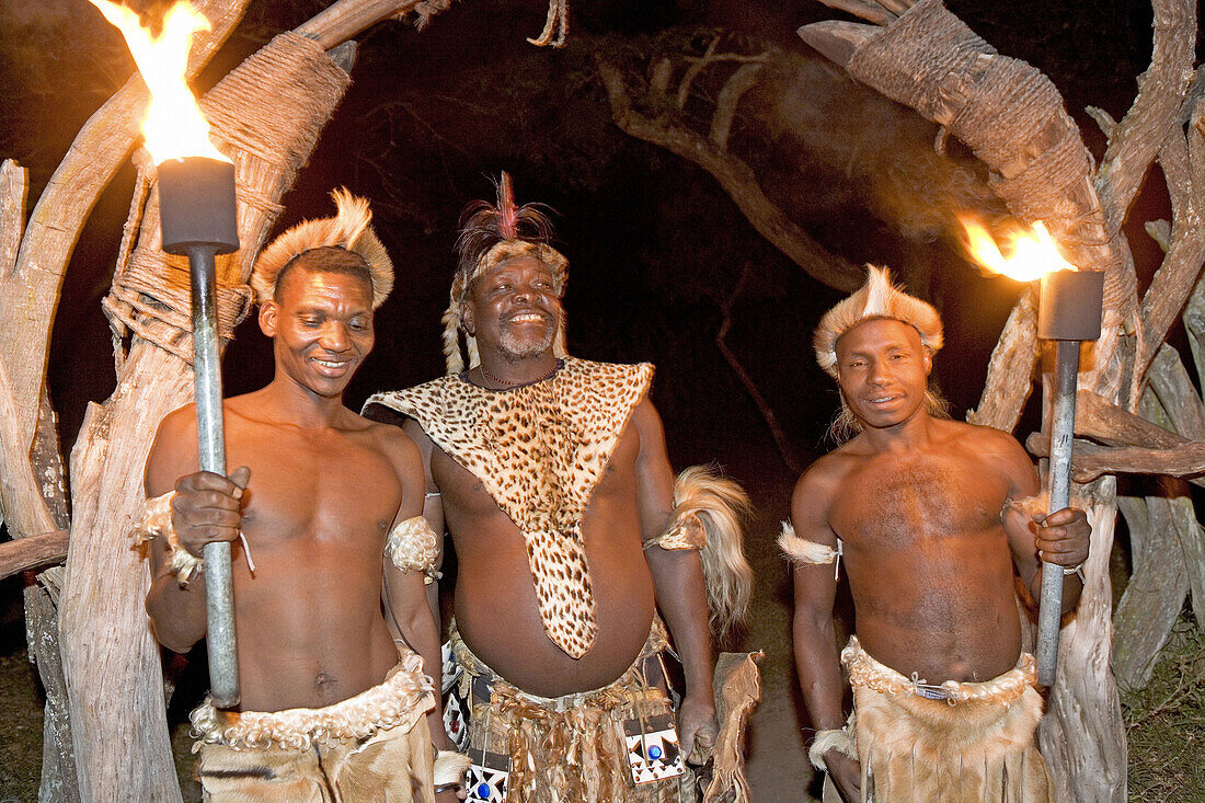 The Chief welcoming visitors at night. The Simunye zulu village where visitors can be accomodated in zulu style, traditional chief Biyela. Kwazulu-Natal province. South Africa