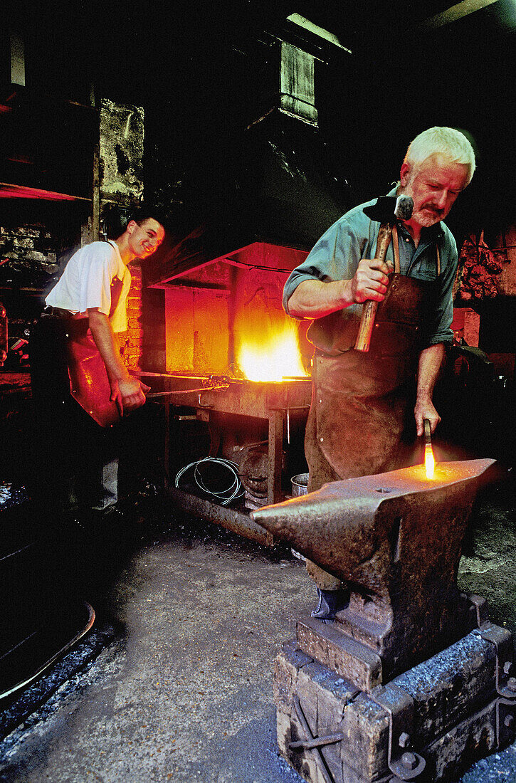 Jacques Martin blacksmith at work, Conches-en-Ouches. Eure, Normandy, France