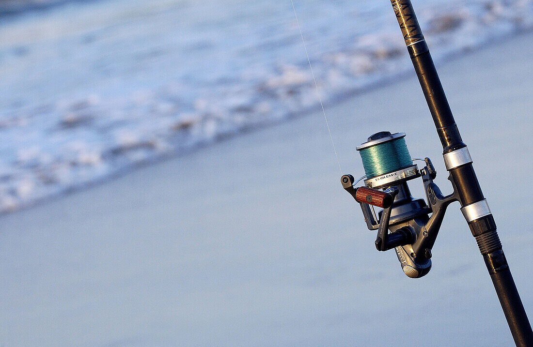 Sport fishing at beach. Hendaye, Aquitaine. France