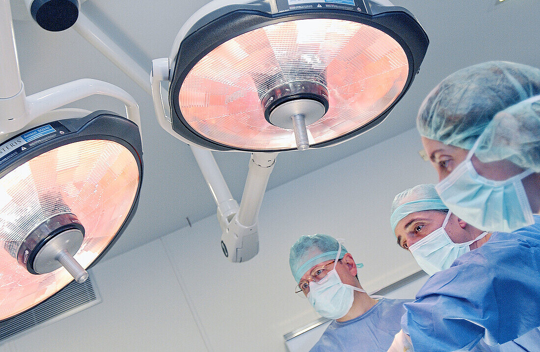 Surgeons at laparoscopy operating room of hospital