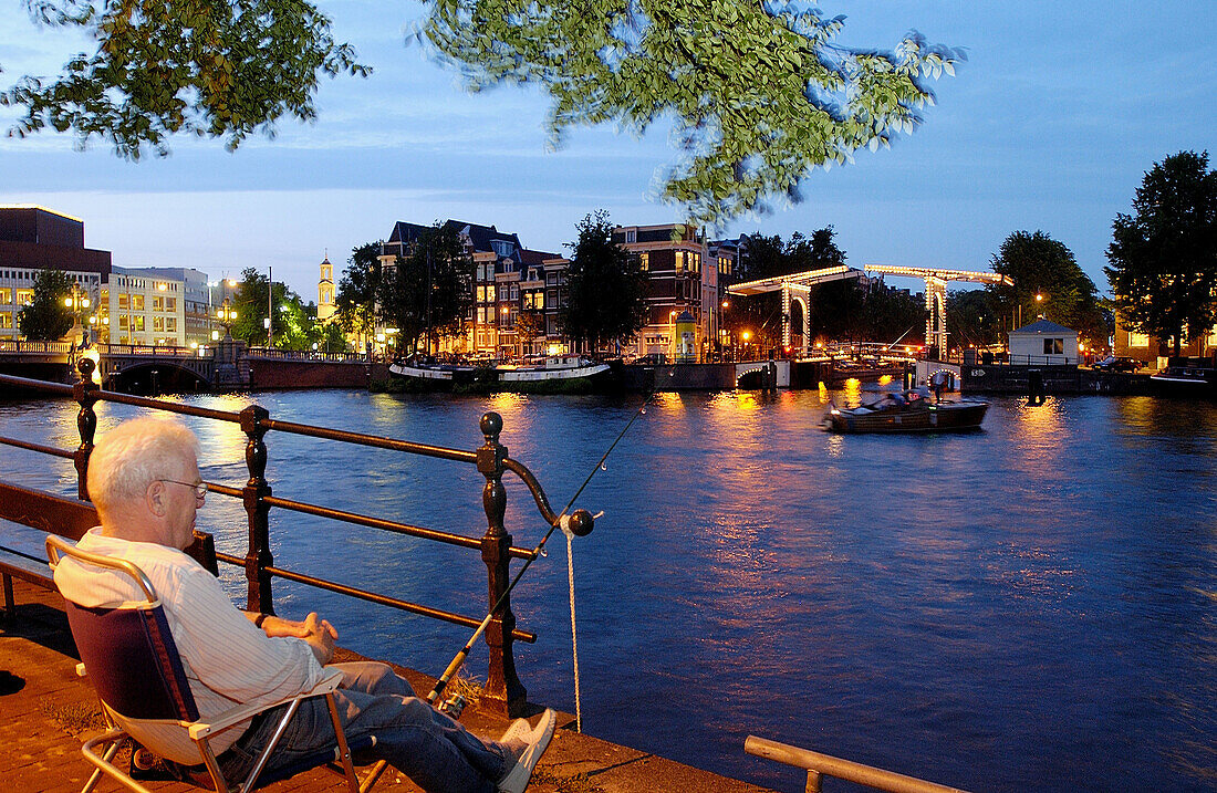 Amstel canal, bridge on new Herengracht. Amsterdam, Netherlands