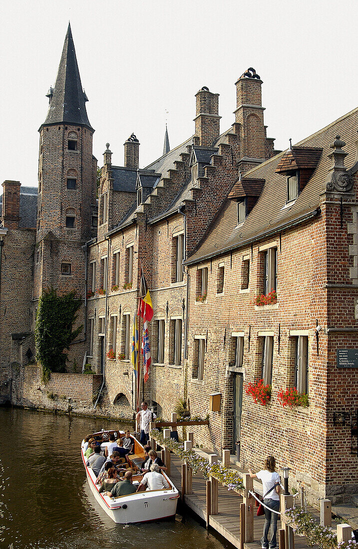 Tourist boat by Rozenhoedkaai. Brugge. Flanders, Belgium