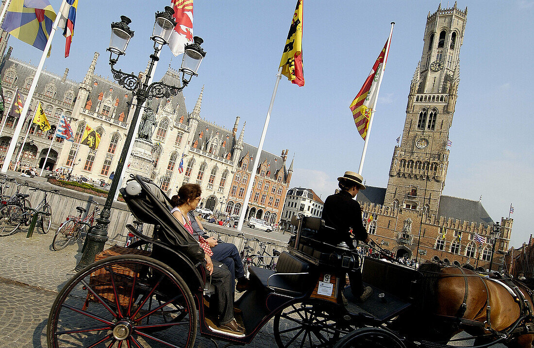 Carriages in Markt (Market Square). Brugge. Flanders, Belgium