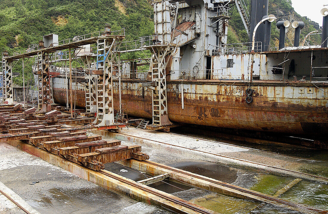 Ship in in Ondartxo abandoned shipyard. Pasajes harbour. Pasaia. Guipuzcoa. Euskadi. Spain.