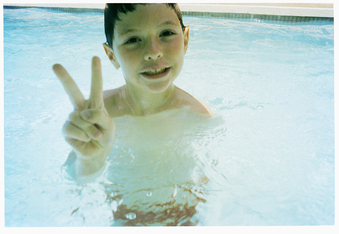 ucasians, Child, Children, Color, Colour, Contemporary, Content, Contentment, Dark-haired, Daytime, Exterior, Finger, Fingers, Fun, Gesture, Gestures, Gesturing, Hand, Hands, Holiday, Holidays, Horizo