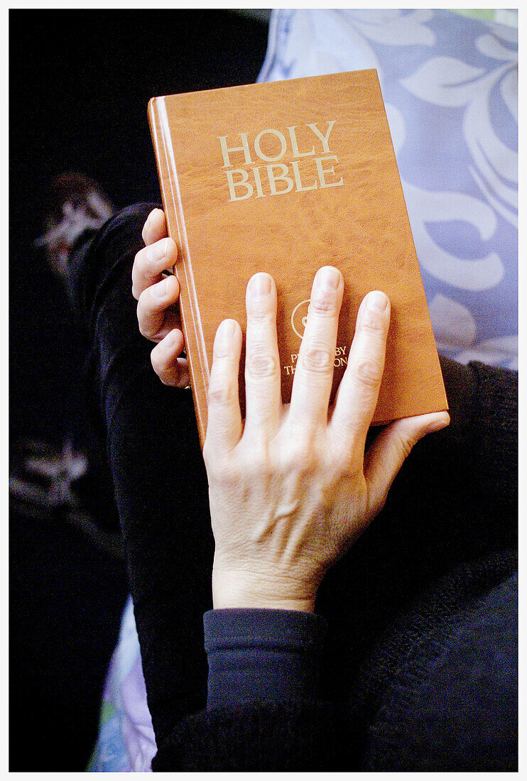  Adult, Adults, Bible, Bibles, Christian, Christianity, Close up, Close-up, Closed, Closeup, Color, Colour, Contemporary, Detail, Details, English, Faith, Hand, Hands, Holy Bible, Holy book, Holy books, Human, Indoor, Indoors, Interior, One, One person, P