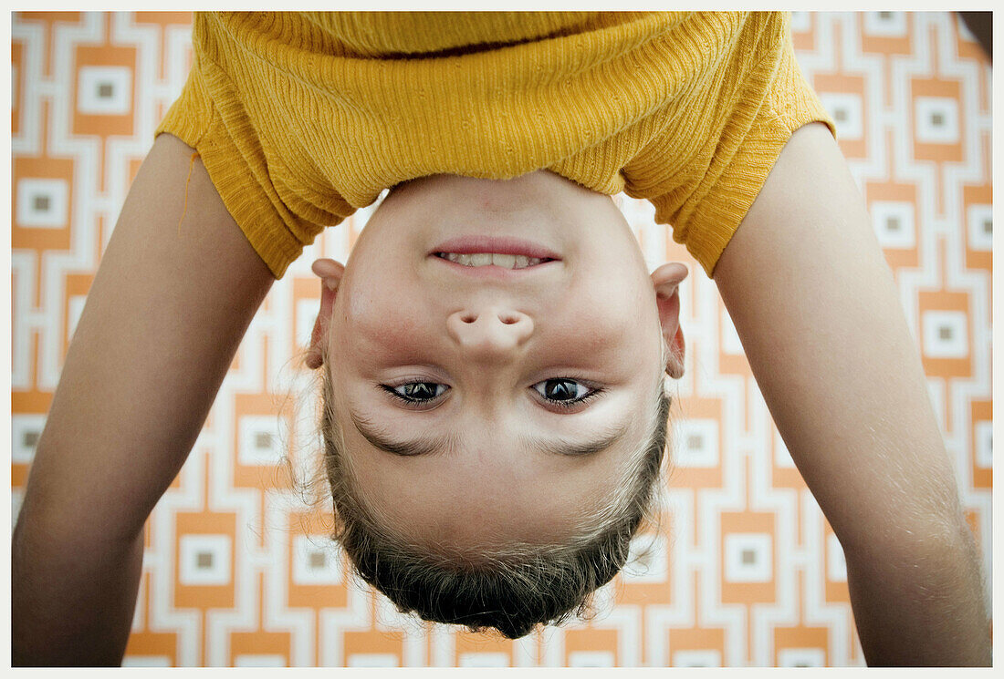 dhood, Children, Close up, Close-up, Closeup, Color, Colour, Contemporary, Equilibrium, Face, Faces, Facing camera, Female, Girl, Girls, Handstand, Handstanding, Headshot, Headshots, Human, Indoor, In