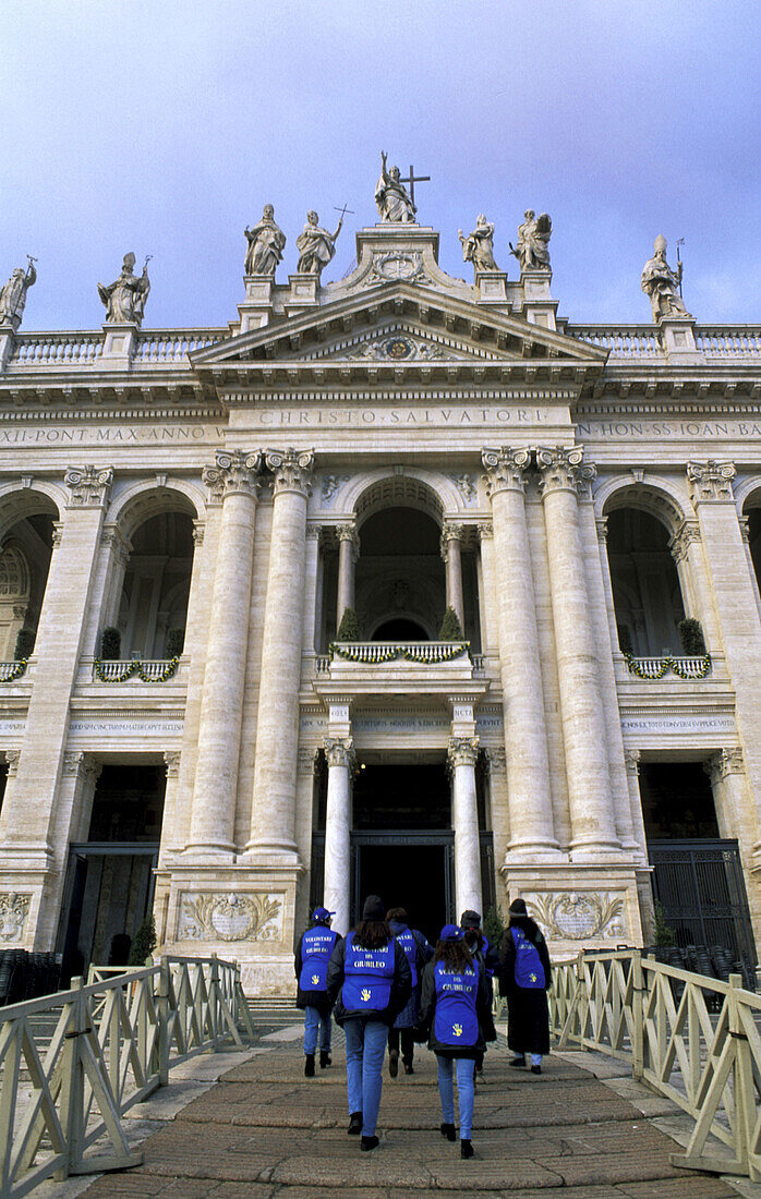 Volunteers of year 2000 jubilee entering the basilica. Saint John Lateran. Rome. Italy