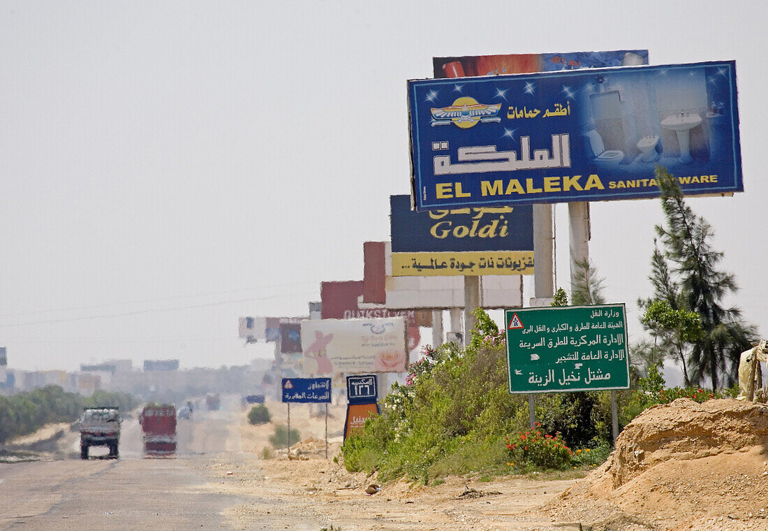 Ad billboards along the road from Cairo to Alexandria. Egypt