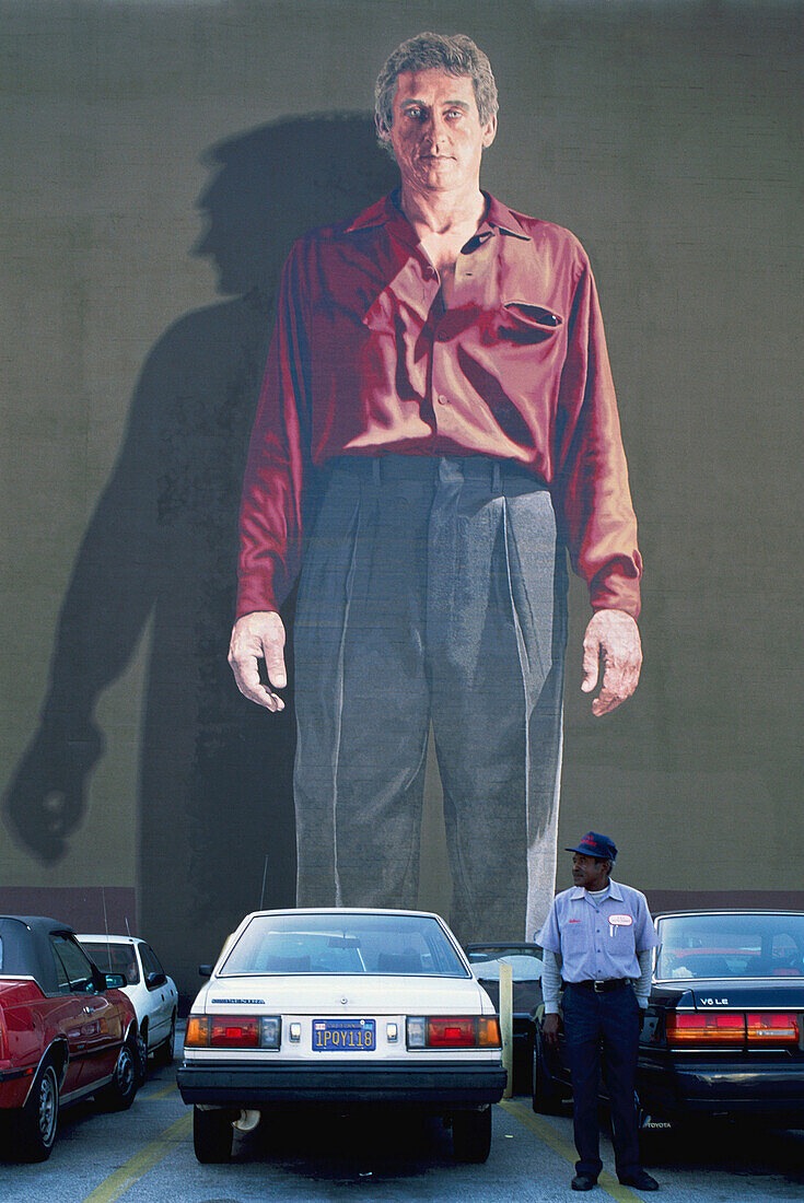 Mural by Ken Mitchell (painted frescoe on a wall) in a downtown parking lot, Los Angeles. California, USA
