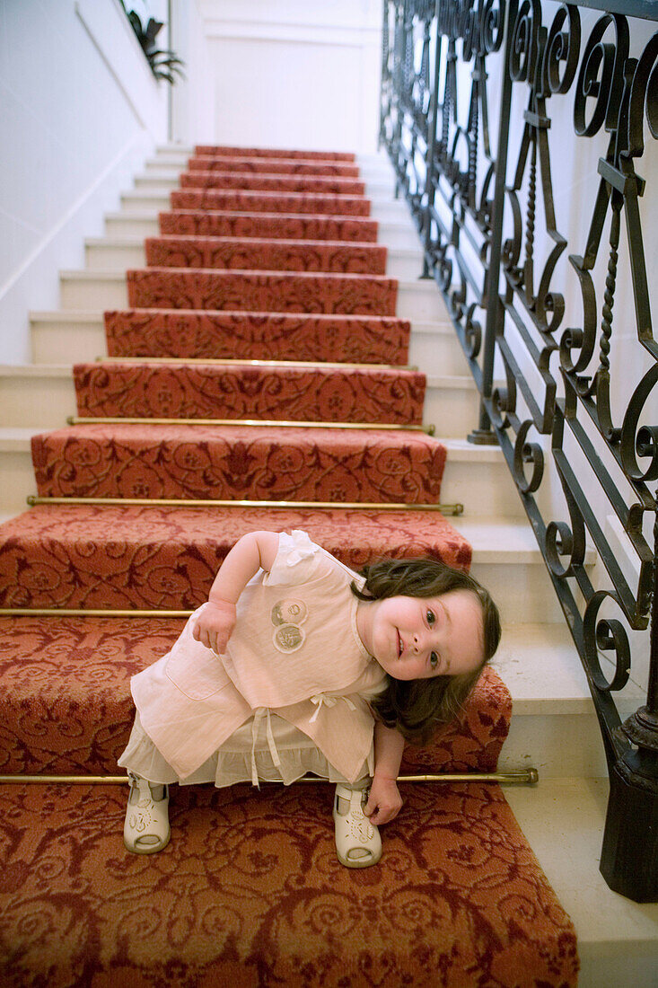 Little girl at Châteu de Rochecotte luxury hotel, Saint-Patrice. Indre-et-Loire, France