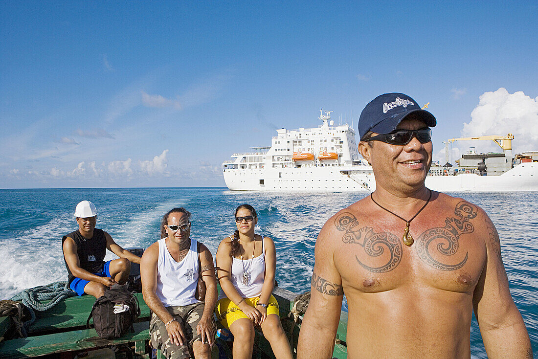 The crew. Tino Tsin Yong, freight head. Cruise on Aranui III, cargo and passenger vessel, delivering goods to Marquesas and Tuamotus islands from Tahiti and picking coprah, fruits and fishes on her way back. Marquesas archipelago. French Polynesia