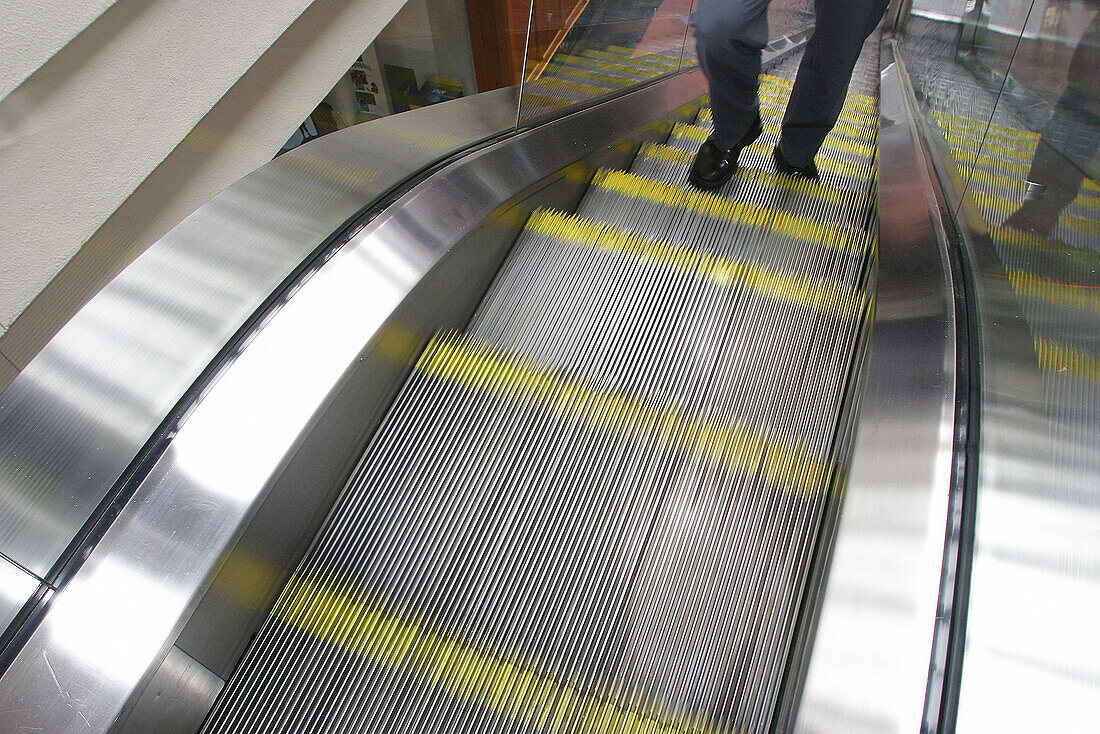  Adult, Adults, Anonymous, Ascending, Business, Businessman, Businessmen, Businesspeople, Businessperson, Climb, Climbing, Color, Colour, Contemporary, Detail, Details, Economy, Escalator, Escalators, Executive, Executives, Horizontal, Human, Indoor, Indo