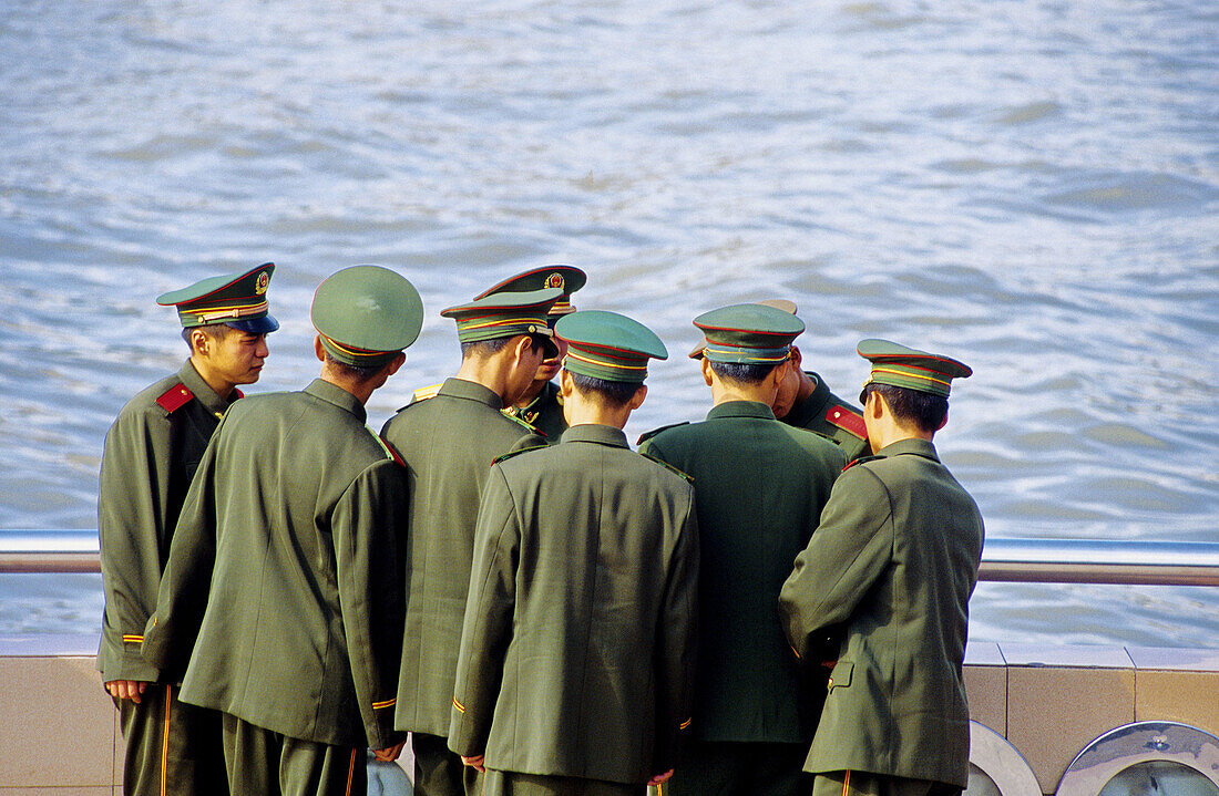 Chinese people and tourists visiting Pudong new town on river bank. Shanghai. China