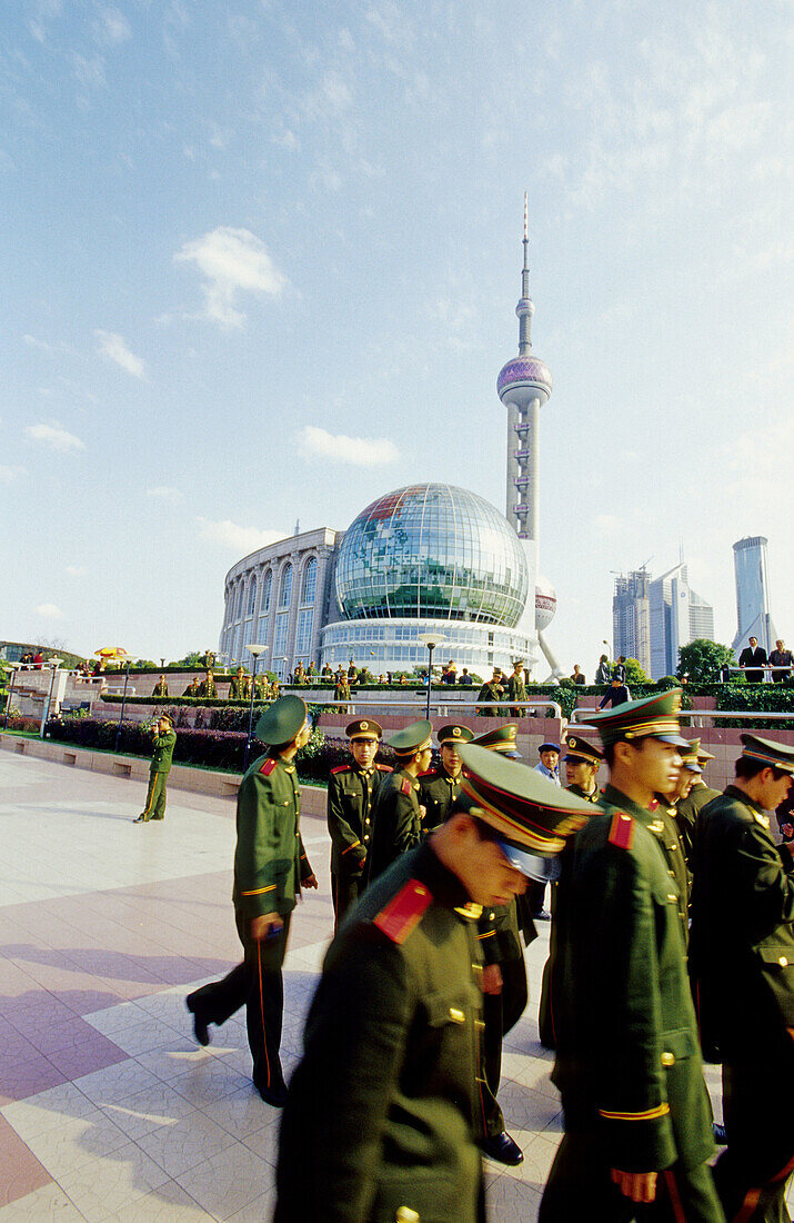 Chinese people and tourists visiting Pudong new town on river bank. Shanghai. China