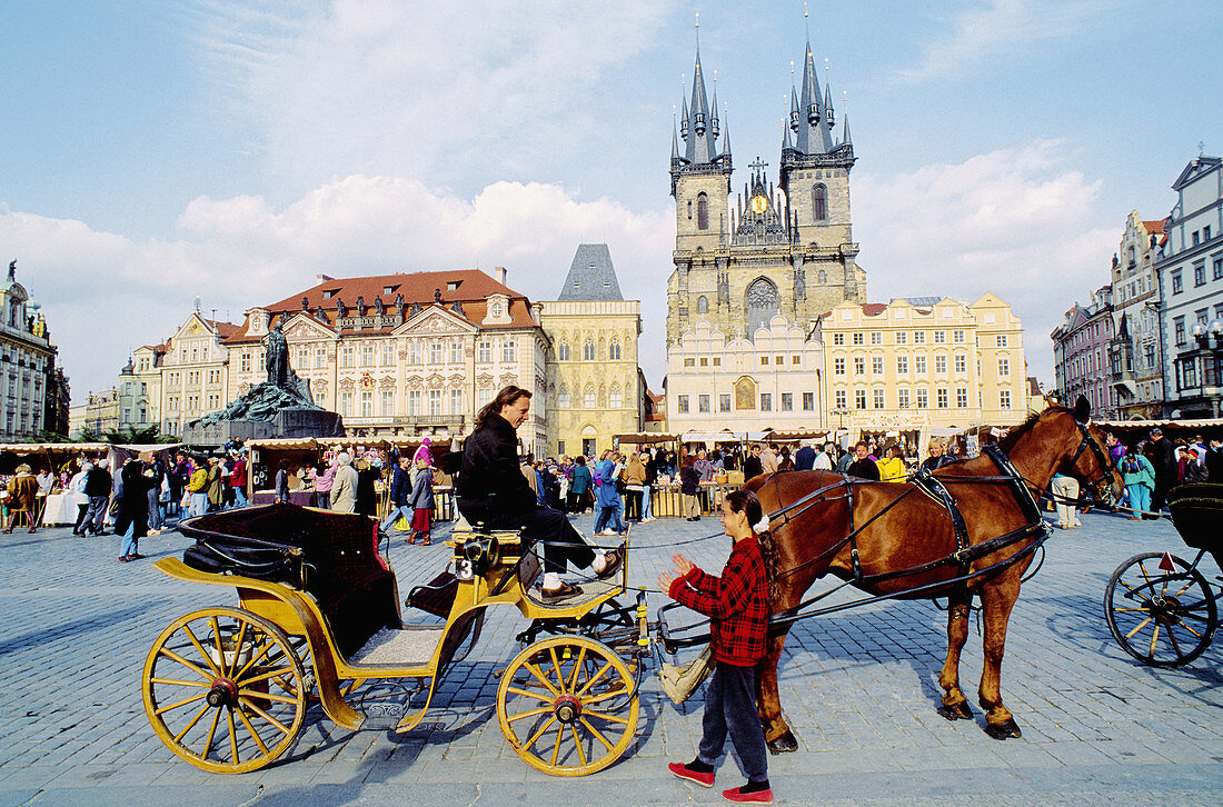 Horse carriage and Tyn church at Staromestské Namesti (Old Town Square). Prague. Czech Republic