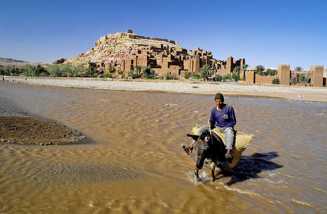 Ait Ben-Haddu Ksar (adobe fortress), river (oued) in spring. South, Ouarzazate region. Morocco.