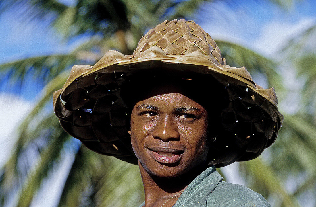 Young worker in Mr Babin s banana plantation. Guadaloupe, French Antilles. France.