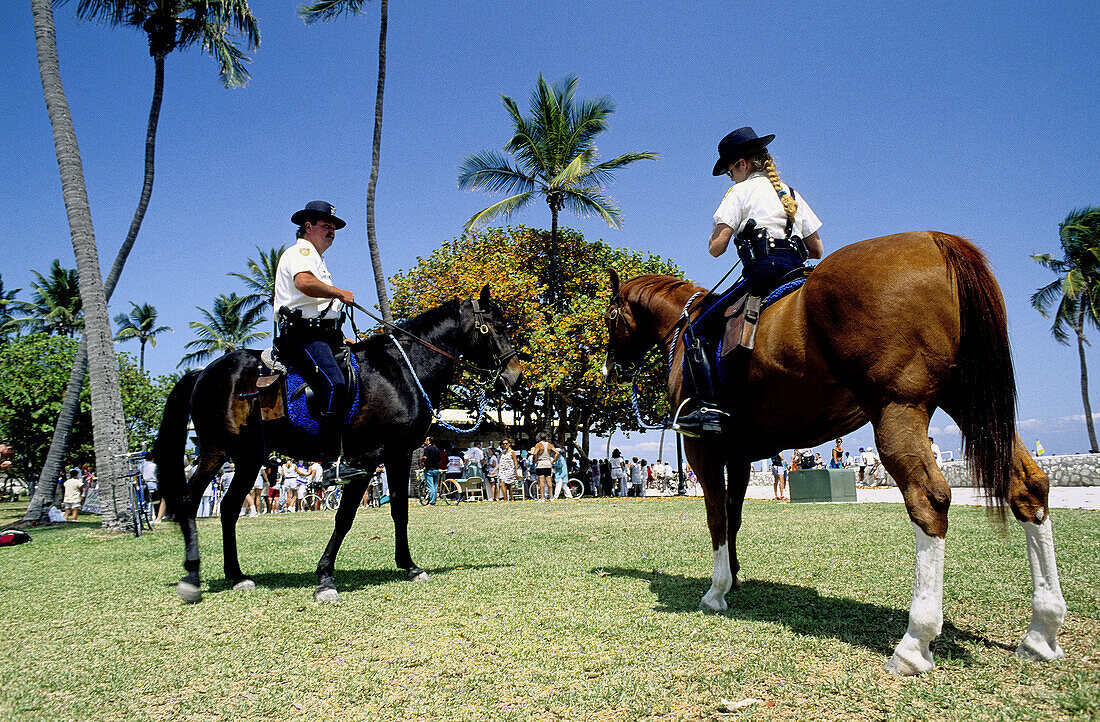 Mounted policemen along the beaches . Ocean Drive in the Art Deco district. Miami Beach, Florida. USA.