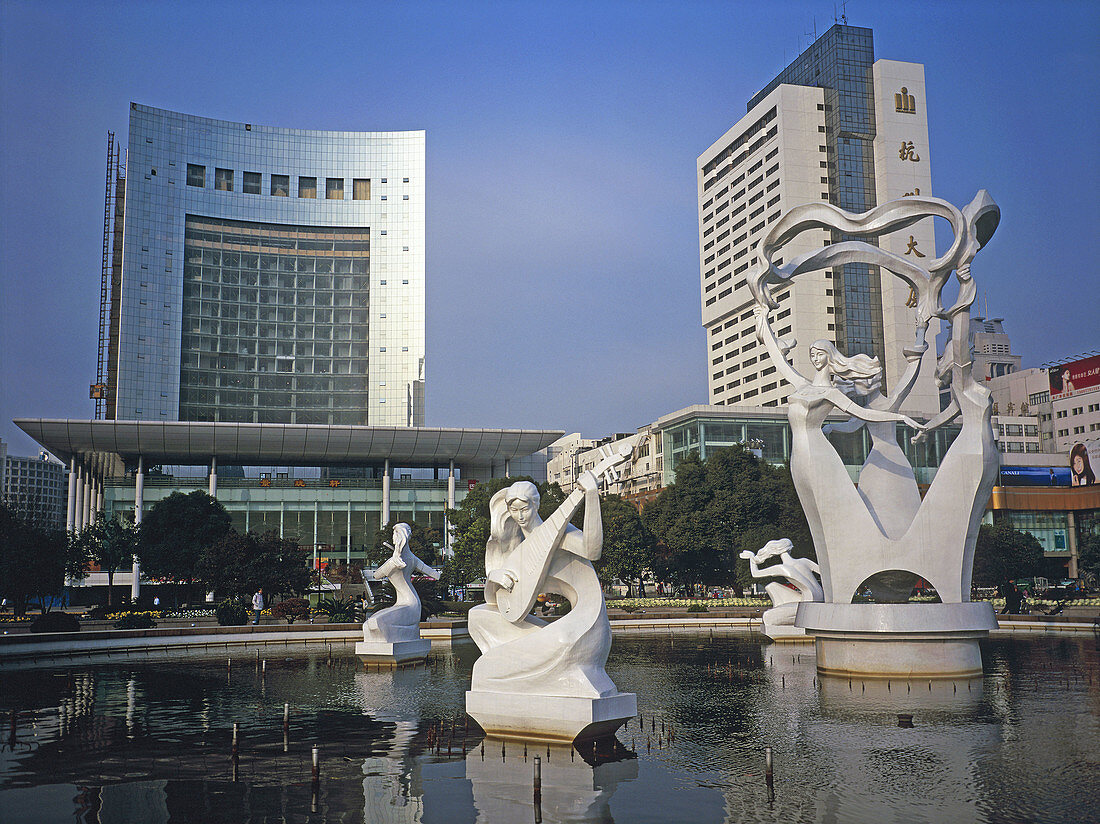 People Square: City Hall and basin with sculptures at fore. Hangzhou. Zhejiang province, China