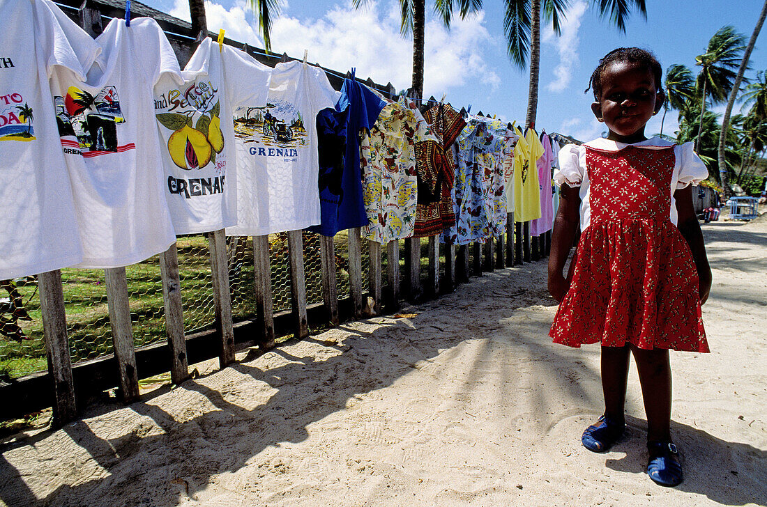 T-shirts for sale to the tourists. Grande Anse beach. Grenada, Caribbean